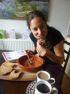 Jane nibbling on a Tostada con Tomate - One of the recipes in our new cookbook - Peace and Parsnips